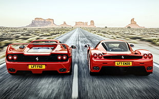 two red Ferrari luxury cars