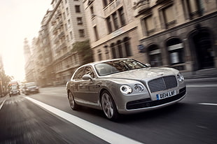 time lapse photography of silver Bentley sedan