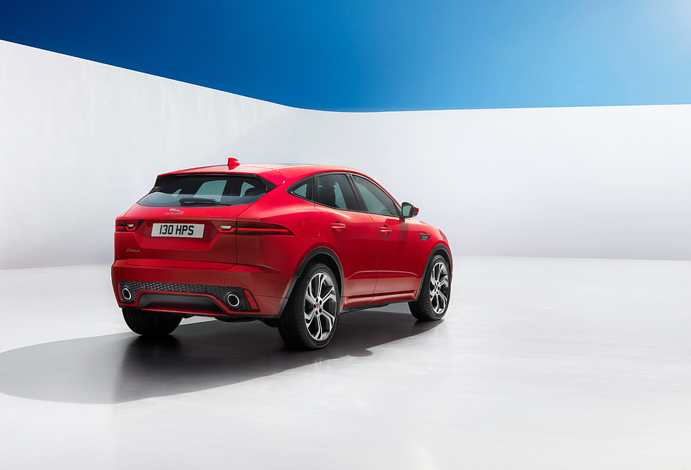 red SUV during daytime HD wallpaper