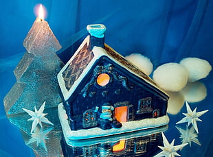 lighted brown and white Star house with chimney miniature