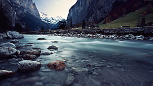 landscape photography of river near mountain alps