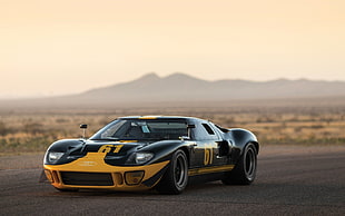 yellow and black Ford GT coupe