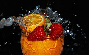 orange and strawberry on glass