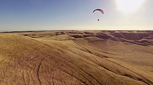 floating parachute over brown field, hart park, bakersfield