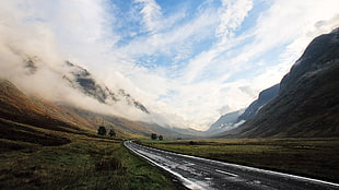 landscape photography of hi-way and mountains during daytime