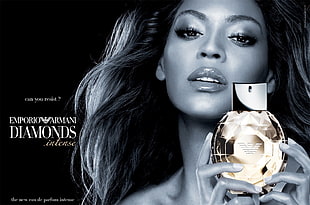 Beyonce holding Emporio Armani Diamonds bottle poster HD wallpaper