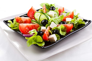 vegetable salad on black ceramic plate