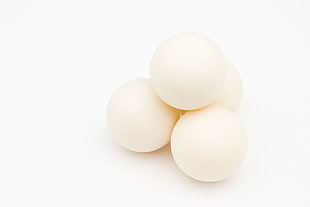 four white balls HD wallpaper