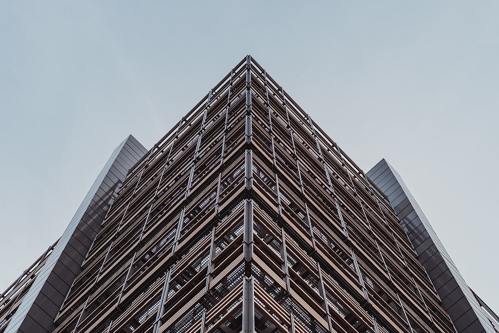 architectural brown and white concrete building HD wallpaper