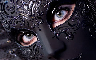 closeup photography of woman wearing black mask