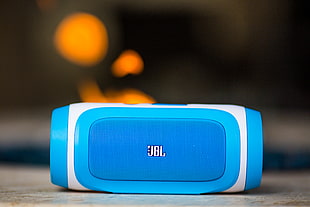 blue and white JBL portable speaker
