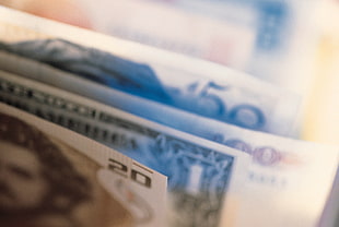 closeup photo of 20, 1, 100, and 50 banknotes