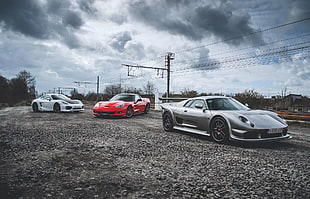 gray, red, and white super cars