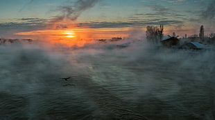 body of water surrounded by fog, sunset, nature, landscape, clouds