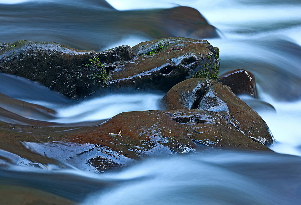 brown and black stones on river banks time lapse photography HD wallpaper