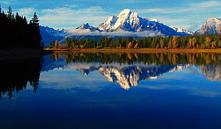 far shot photo of mountain and lake HD wallpaper