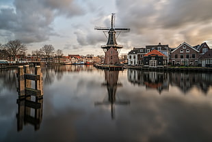 brown and black windmill, city, reflection, windmill, water