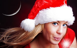 woman wearing santa hat portrait photo