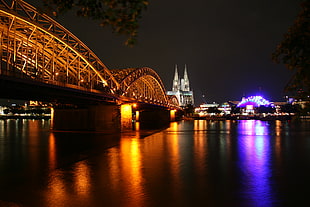 photo of bridge during night, cologne HD wallpaper