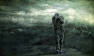 gray scale photo of a man walking on ruined village digital wallpaper HD wallpaper