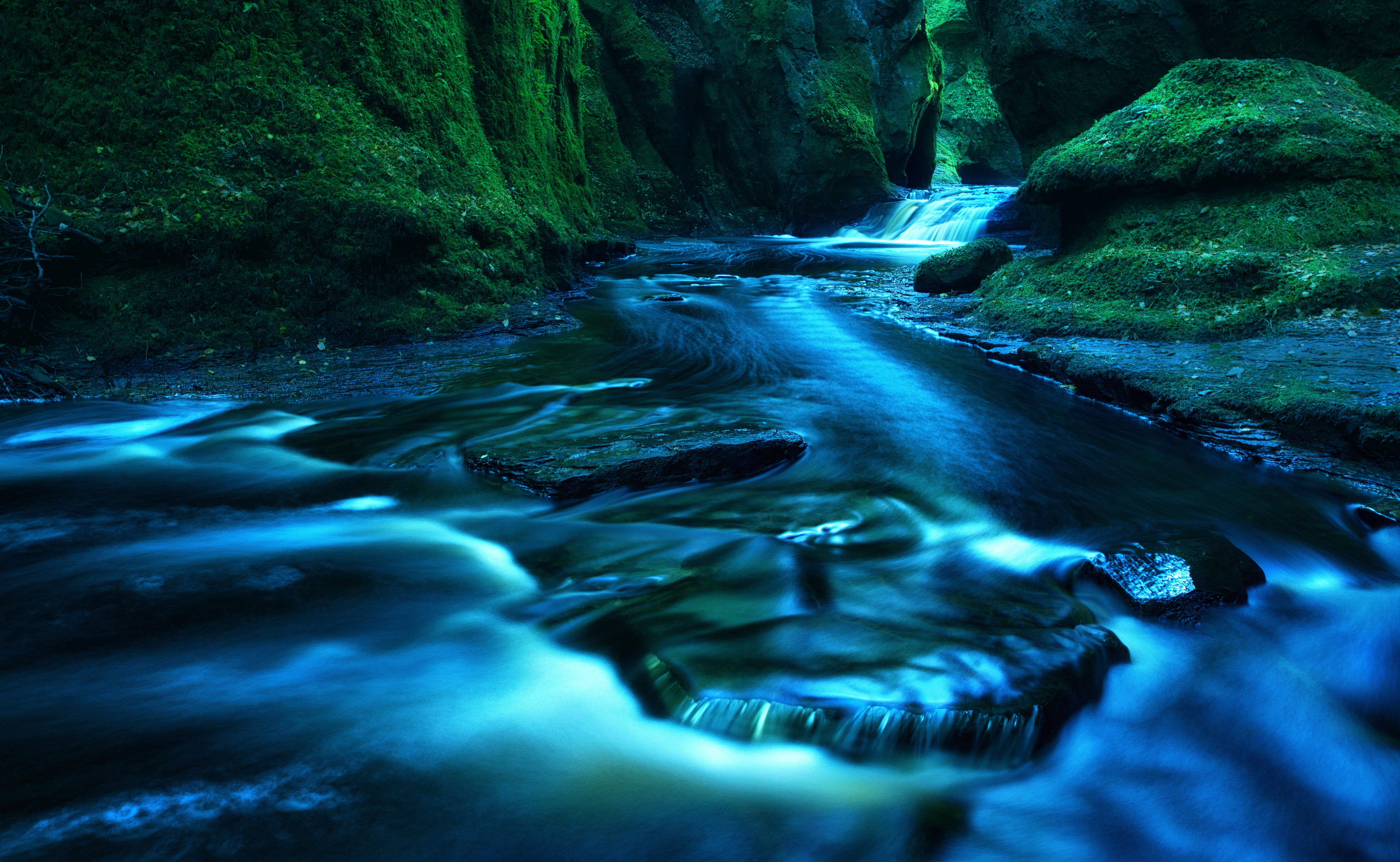 landscape photography of waterfalls and rock formations