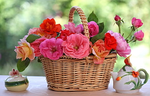 flowers on wicker basket bed white tea pot