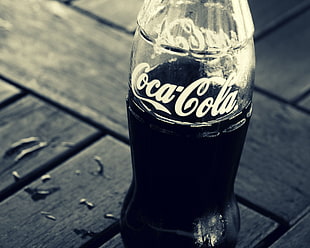 Coca Cola soda bottle with contents