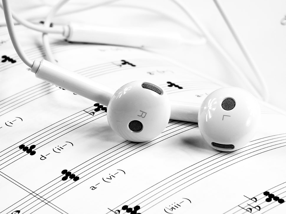 white earphones on white paper HD wallpaper