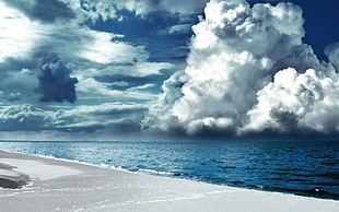 blue ocean with white clouds under blue sky during daytime view HD wallpaper