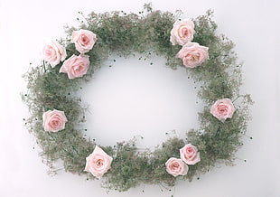 green, white, and pink floral wreath
