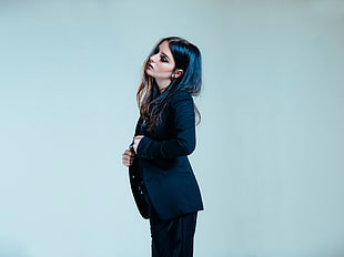 woman wearing black suit coat