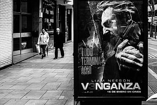 Venganza poster on road