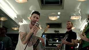 Maroon 5 band in the white wall paint room