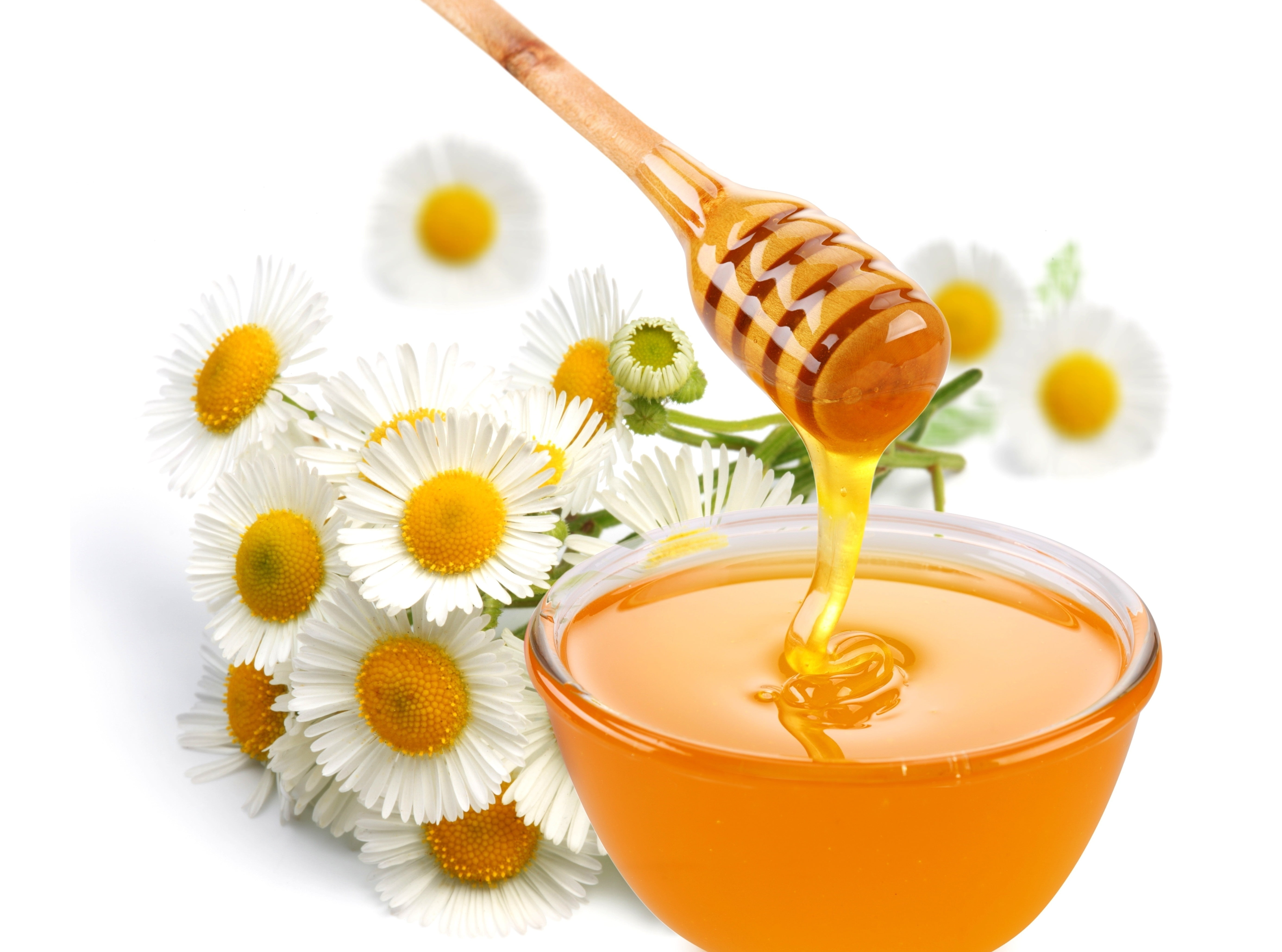 photo of honey on clear glass bowl