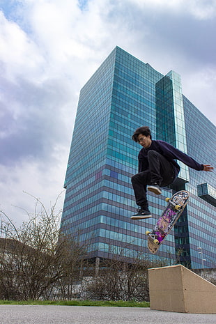 men's black and white plaid dress shirt, skateboarding, reflection, jumping, people