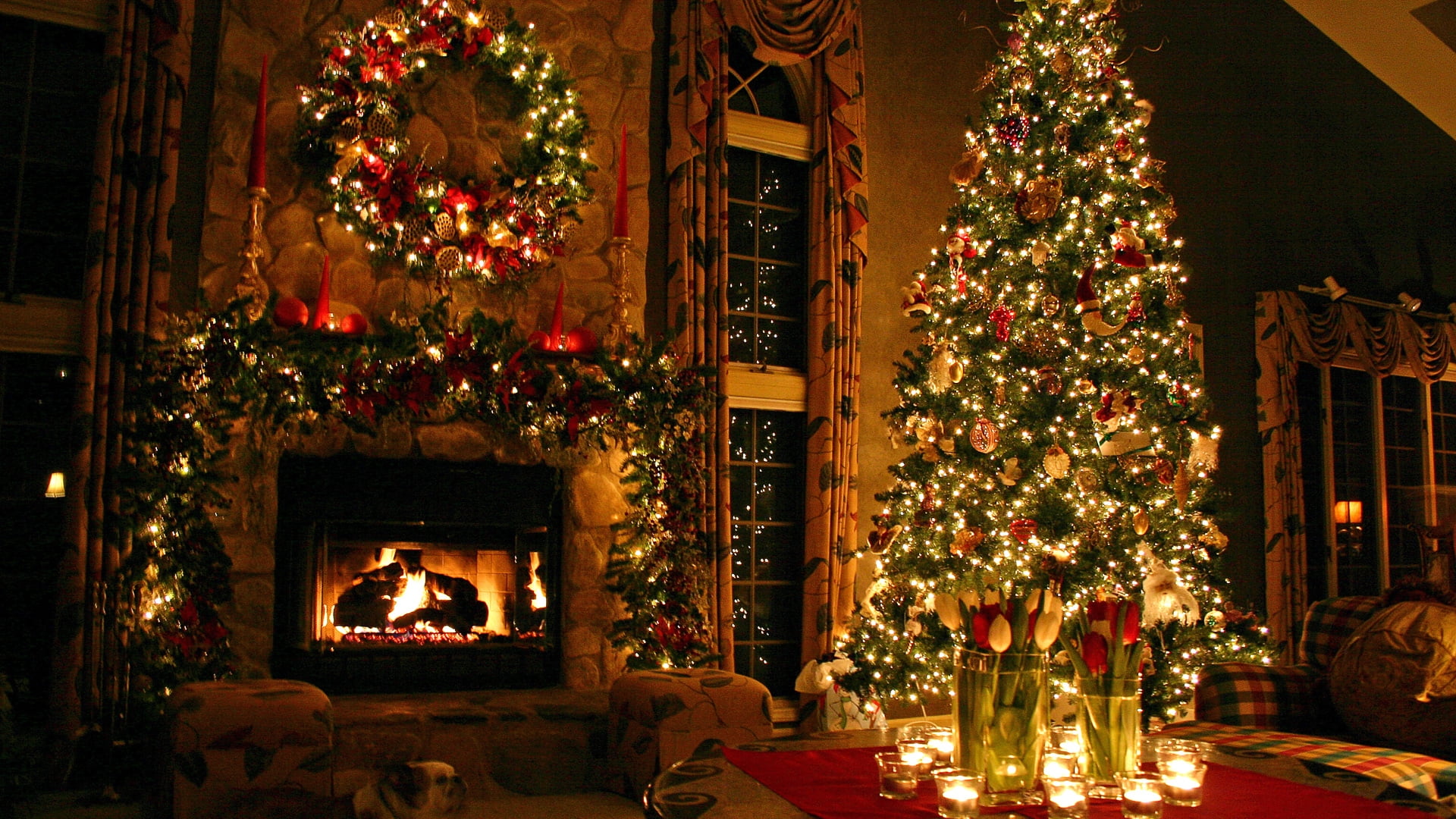 christmas tree beside fireplace