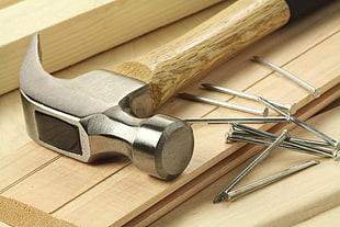 brown handled claw hammer beside nails HD wallpaper