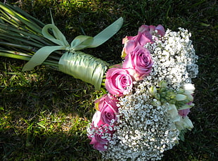 bouquette of pink and white flowers on green grass