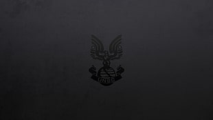 gray and black UNEC coat of arm stamp HD wallpaper
