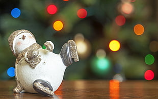 focus photo of snowman figurine