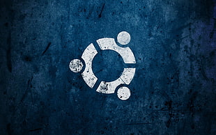 round white logo on blue background