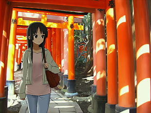 female anime character in white jacket carrying bag walking on orange stands pathway