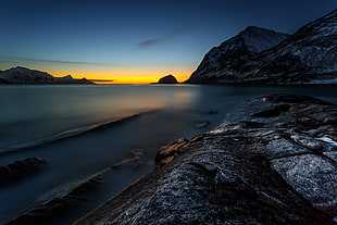 landscape photography of mountain near sea, norway