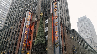Radio City signages, building, snow, 30 Rockefeller Plaza, New York City