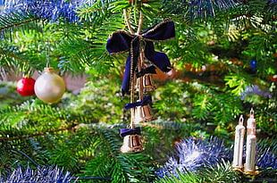 assorted Christmas decors on a tree