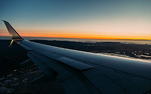 airplane wing during sunset