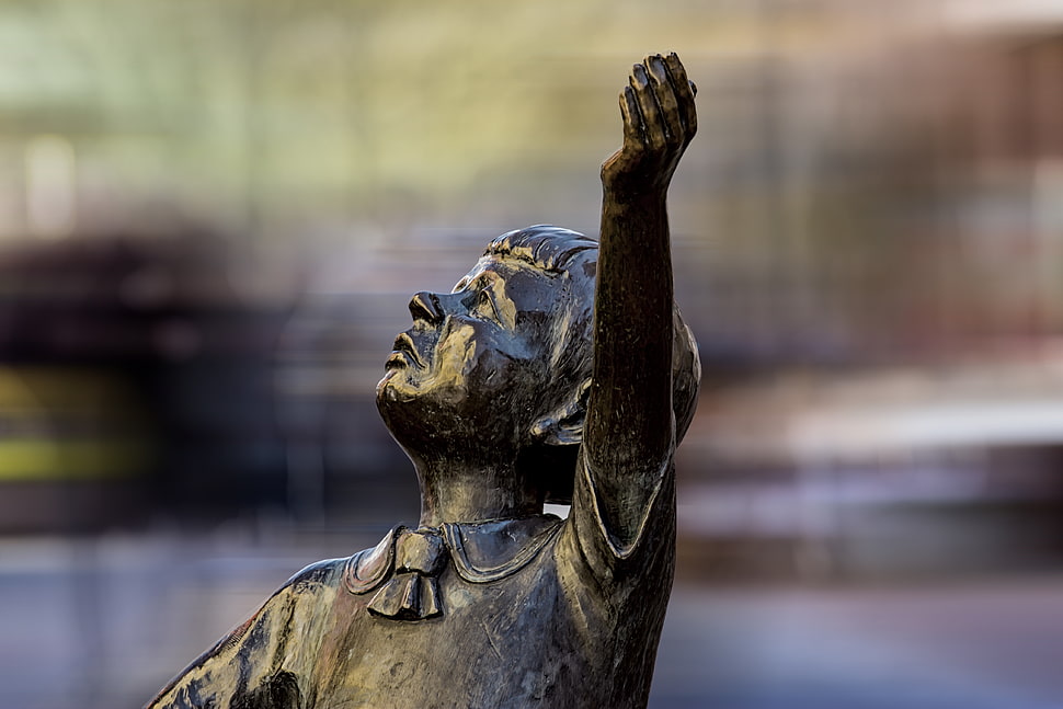 selective focus photo of boy statuette HD wallpaper