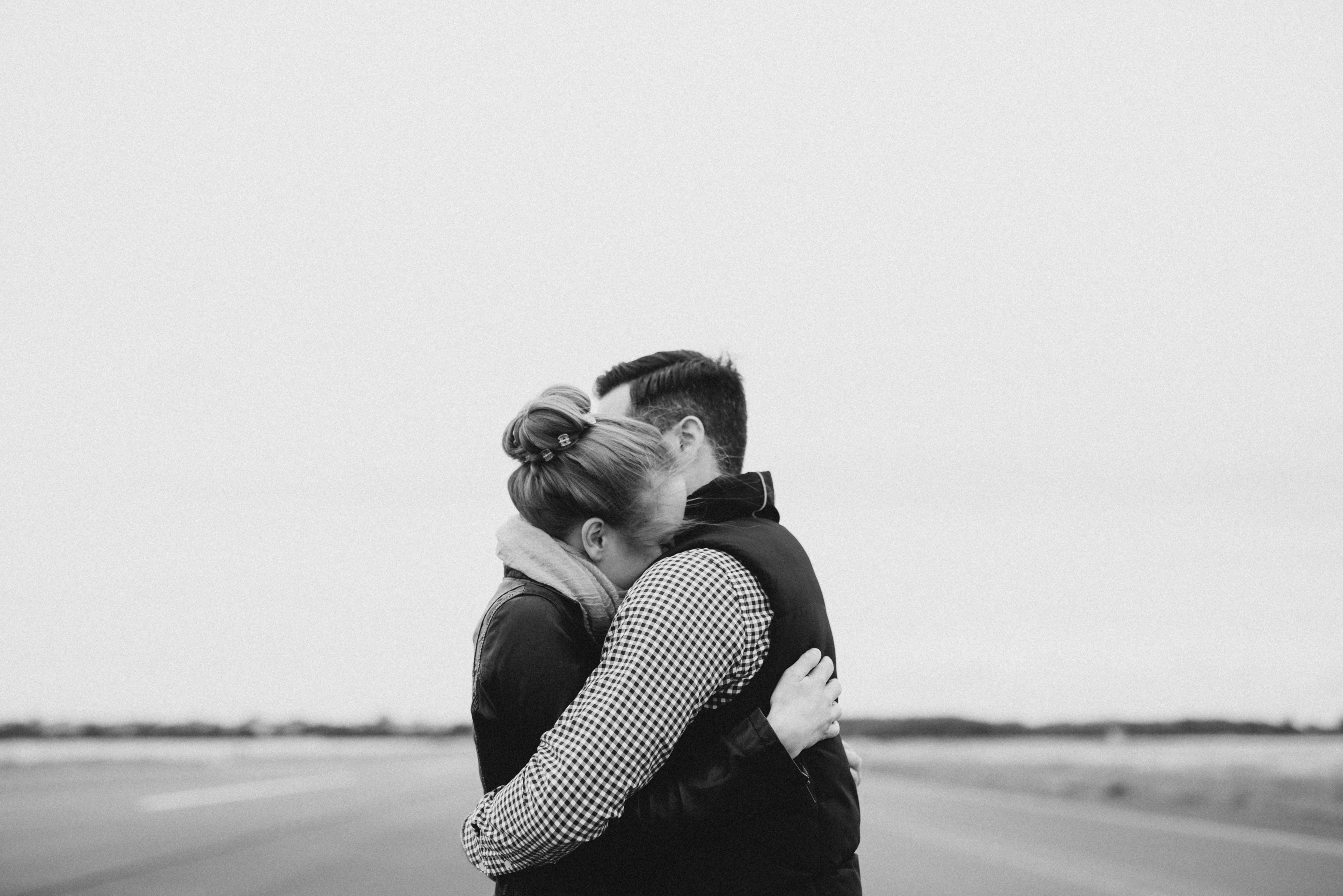 man and woman hugging each other HD wallpaper.