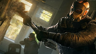 man holding a weapon wearing a black gas mask video game poster