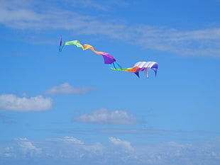green, purple, orange, and white kite